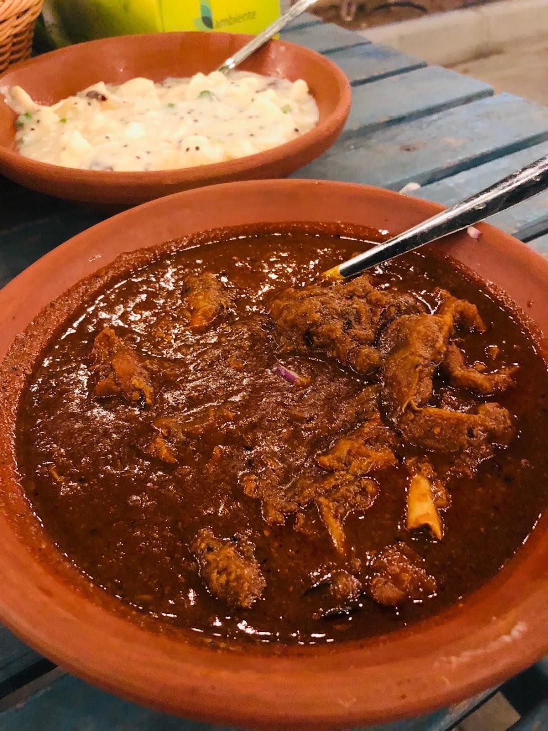 Beef curry in a clay pot