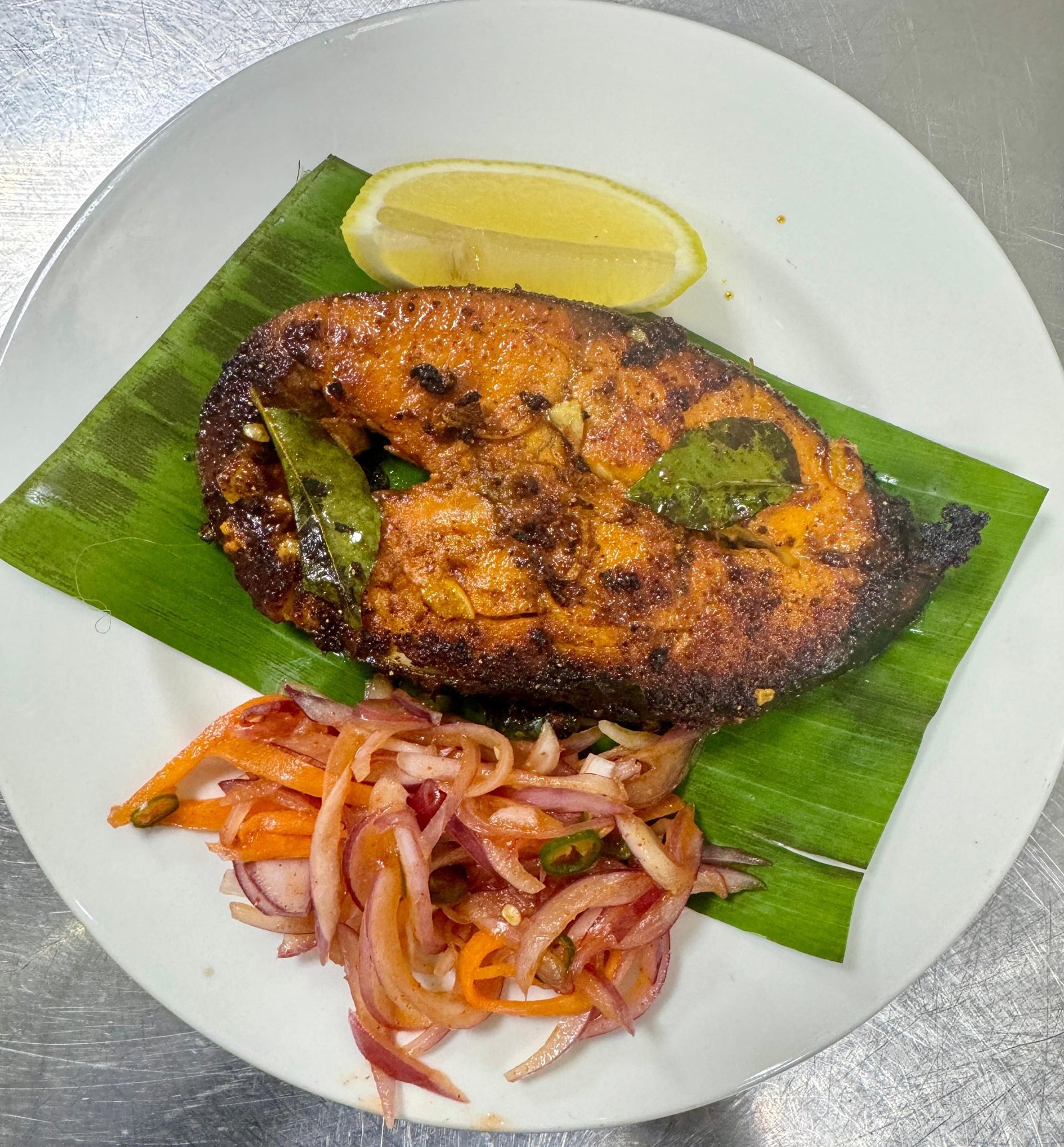 Fish fry served on banana leaf